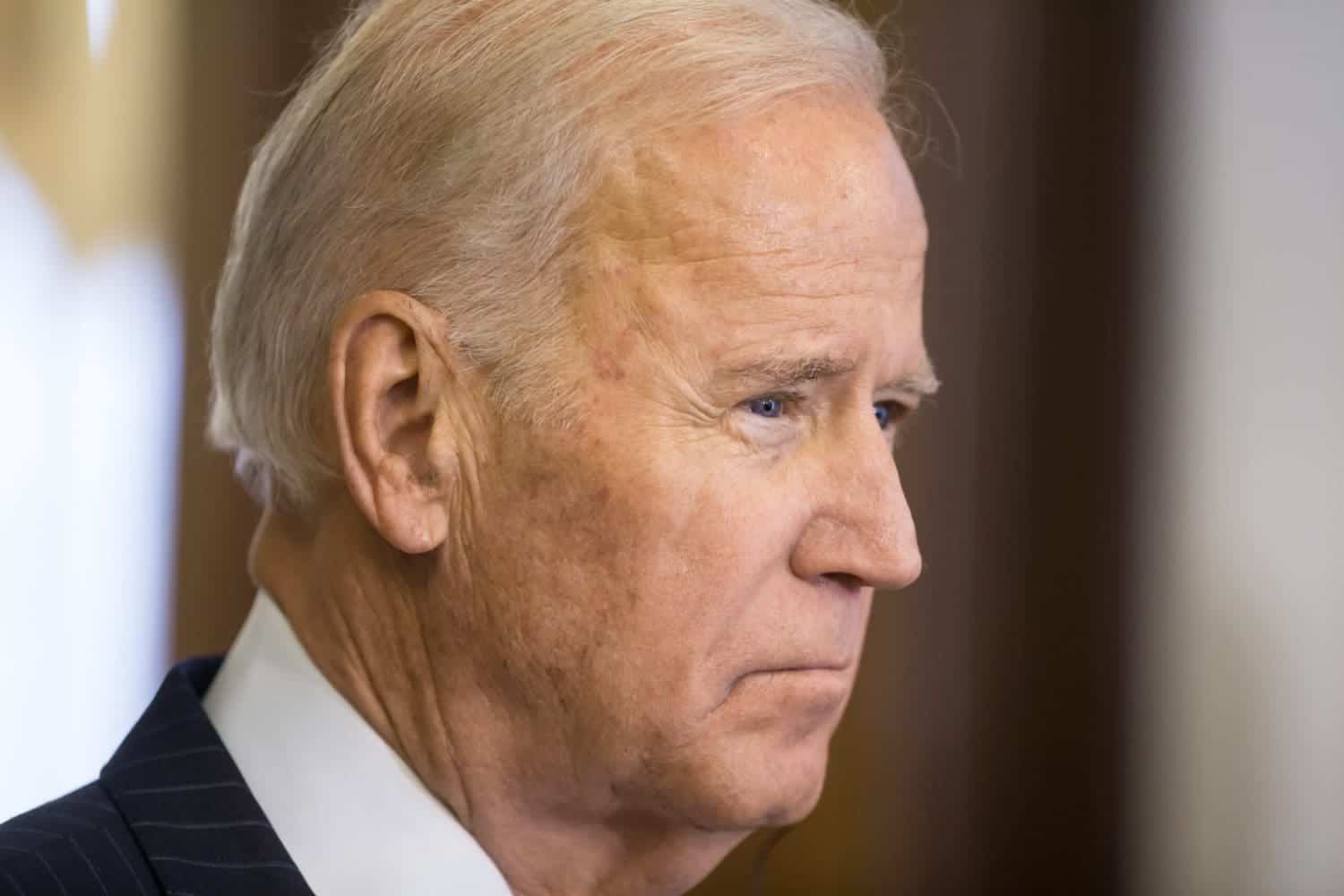 A picture of Joe Biden, current president of US. Joe Biden tweeted about the danger of Americans losing jobs as debt rises.