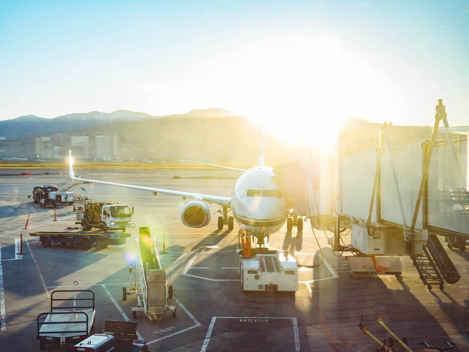 A picture of an airplane standing in an airline. American Airlines & JetBlue partnership blocked by US judge.