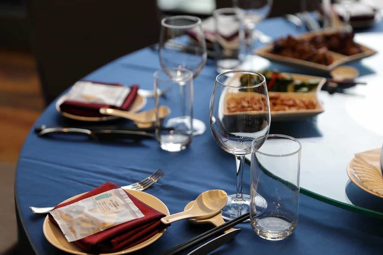 A few glasses and tissues are kept on a circular table.