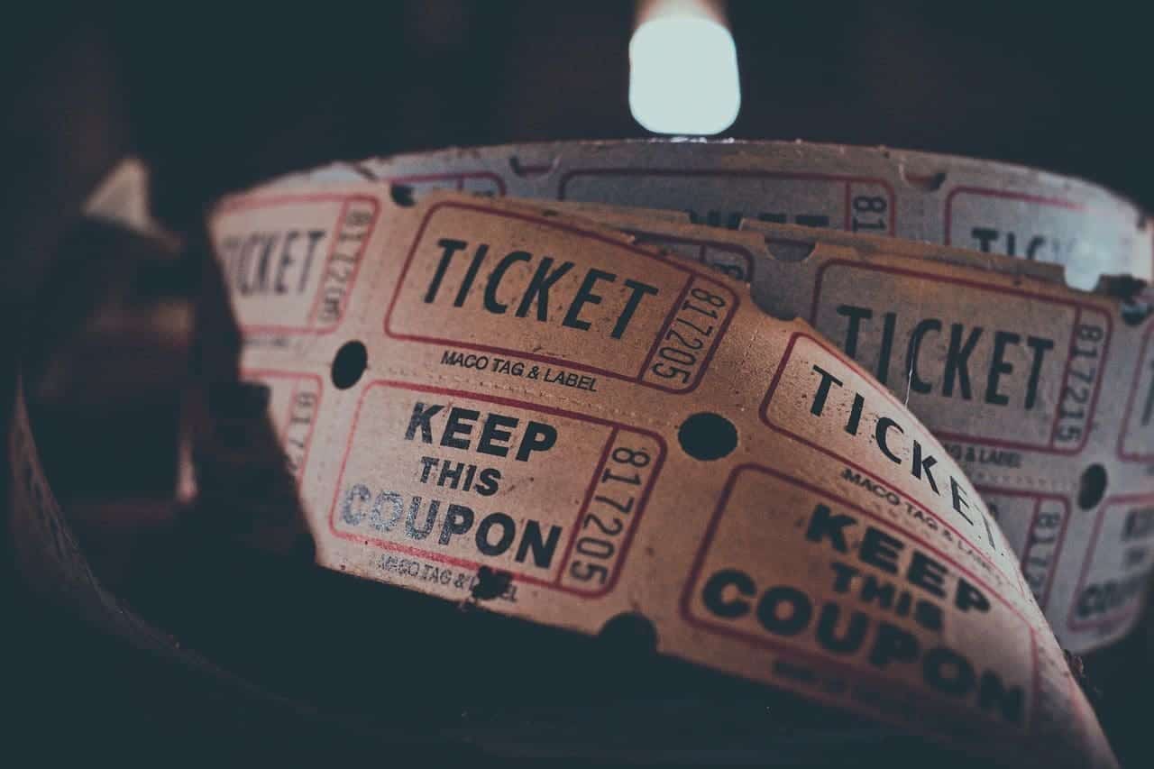 A close-up of a strip of movie tickets.
